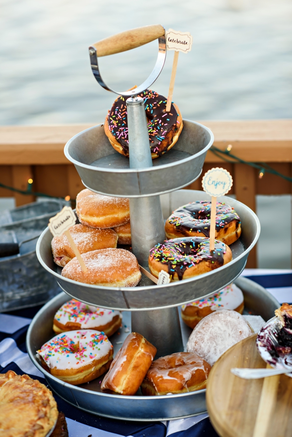 A three tiered donut wedding cake.